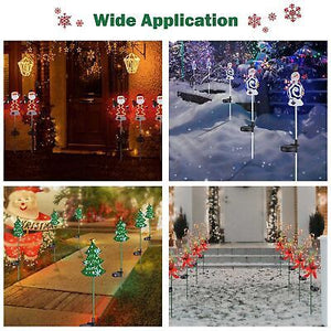 solar-stake-lights-8-pack-santa-snowman-christmas-tree-led-pathway-yard-garden-76.png