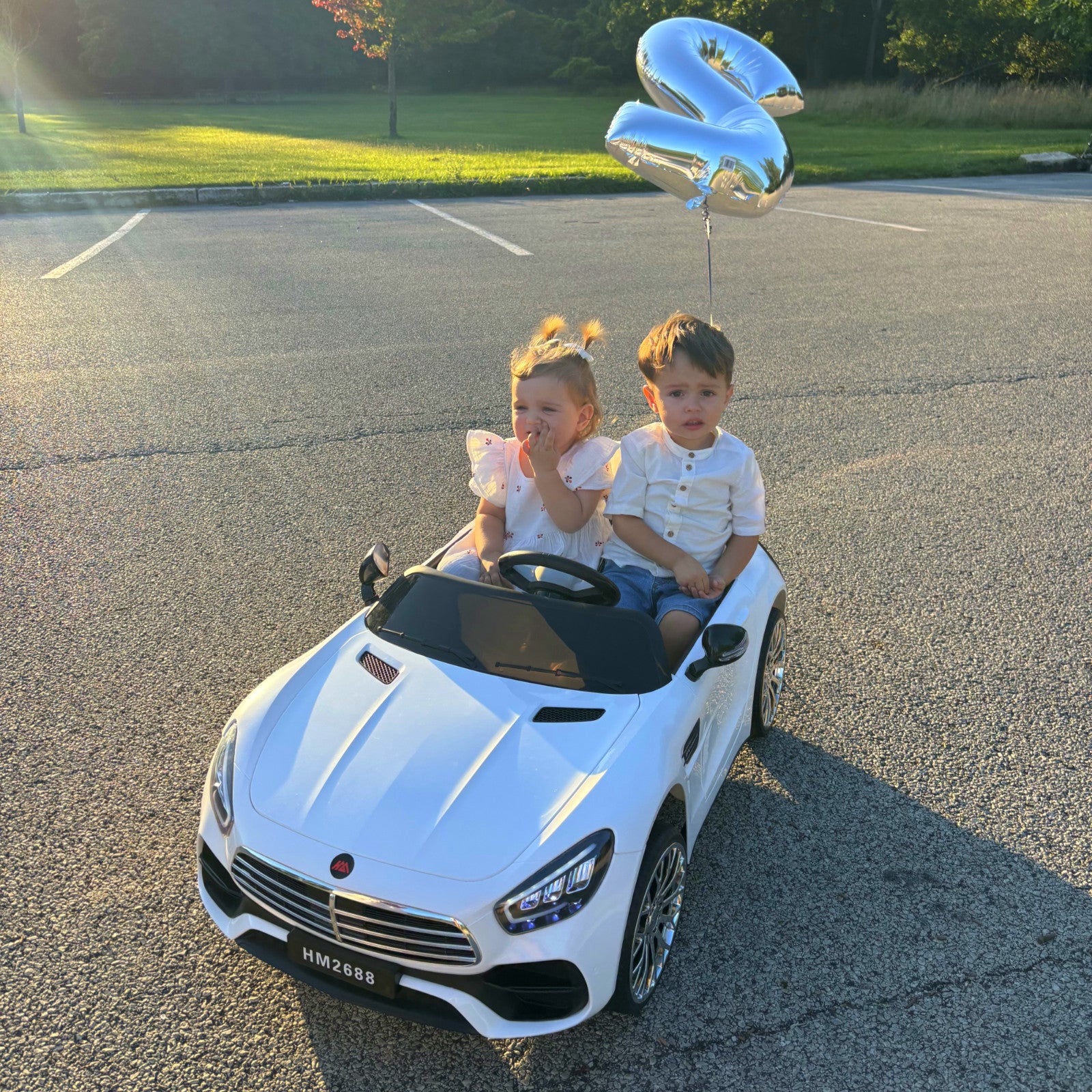 12V 7AH Ride-On 2-Seater Power Wheels Car with Remote, Bluetooth, LED Lights, and MP3 Player Trend Times 1