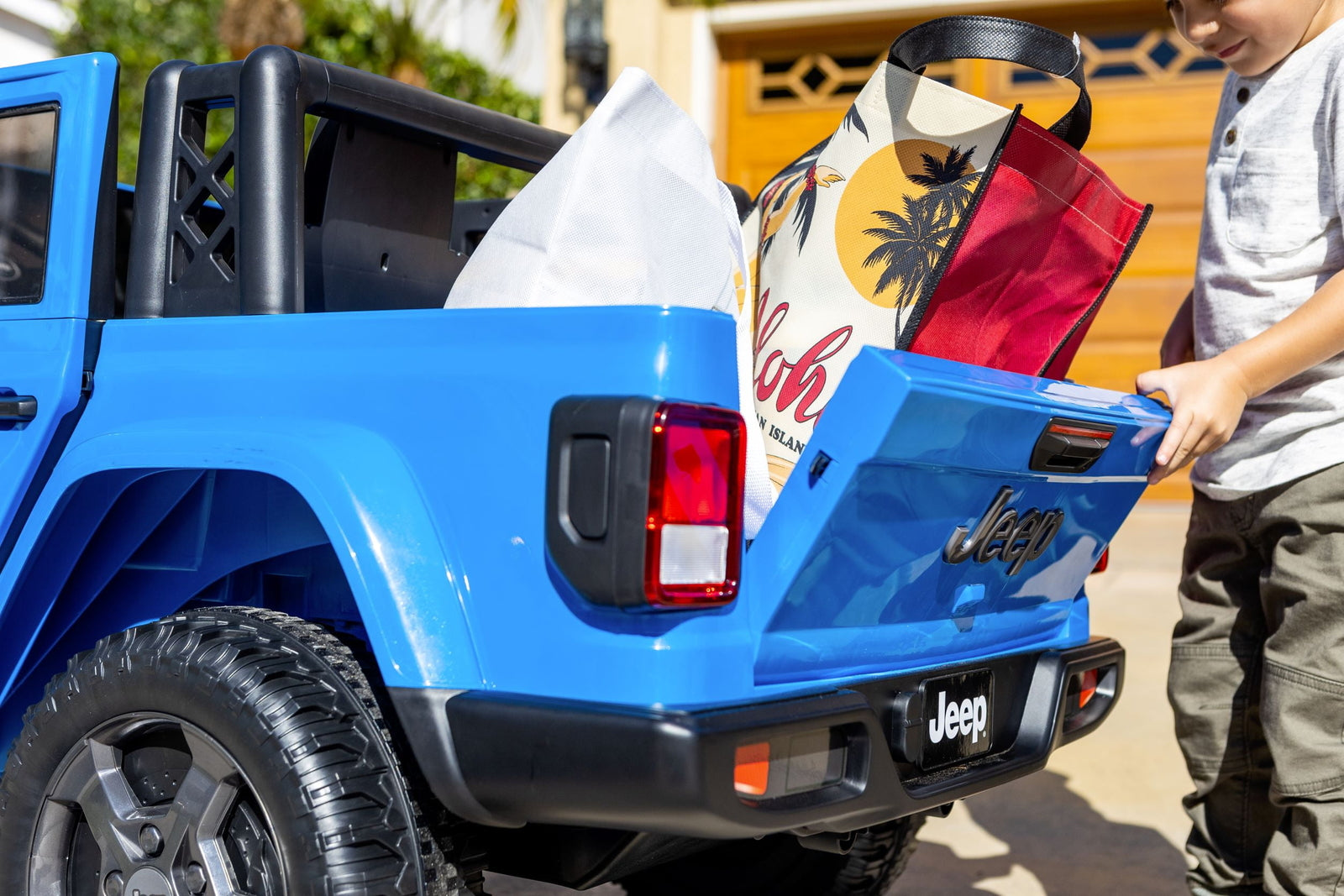 12V Gladiator Rubicon Battery-Powered 2-Seater Ride-On Vehicle in Blue Trend Times 4