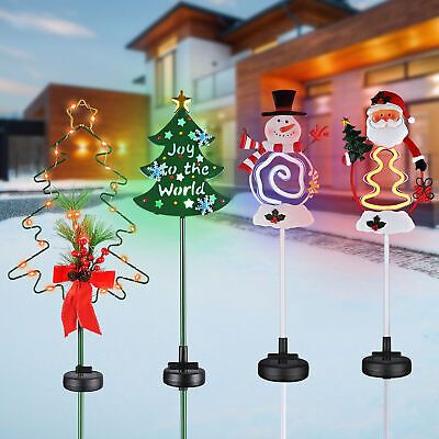 solar-stake-lights-8-pack-santa-snowman-christmas-tree-led-pathway-yard-garden-72.png